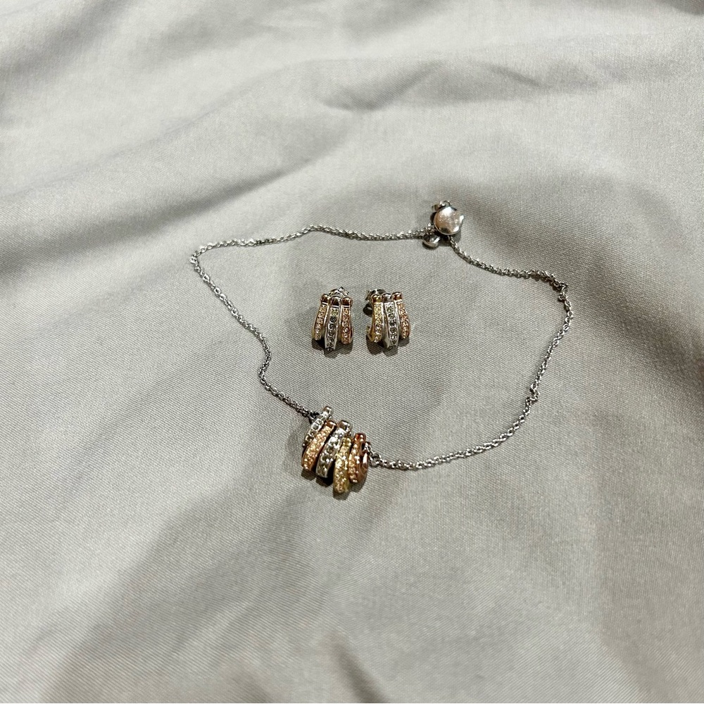Coach tri-metal bracelet and earring set